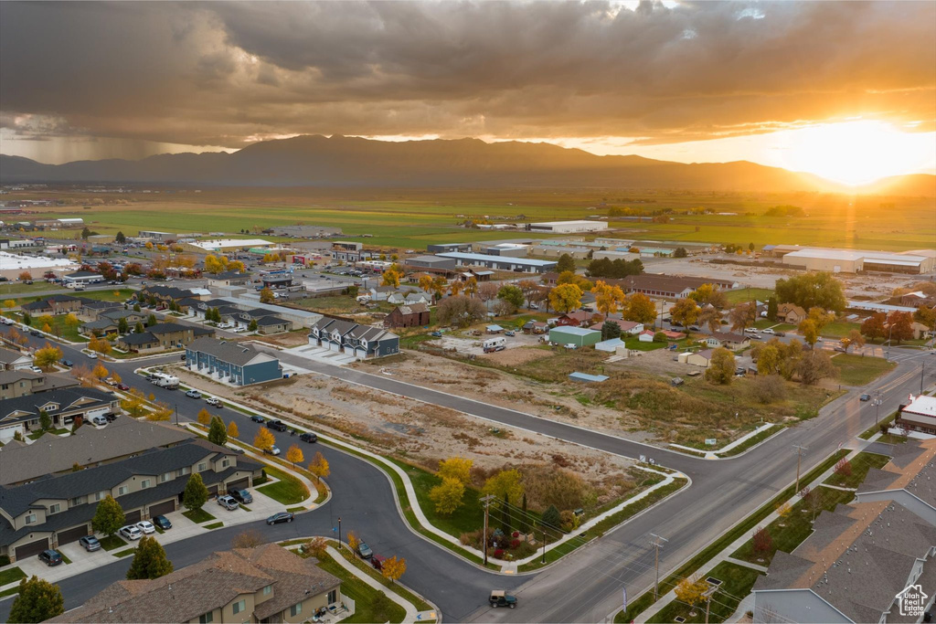 Aerial view at dusk featuring a mountain view