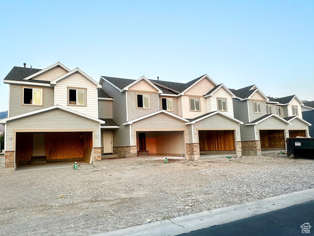 View of front of home featuring a garage