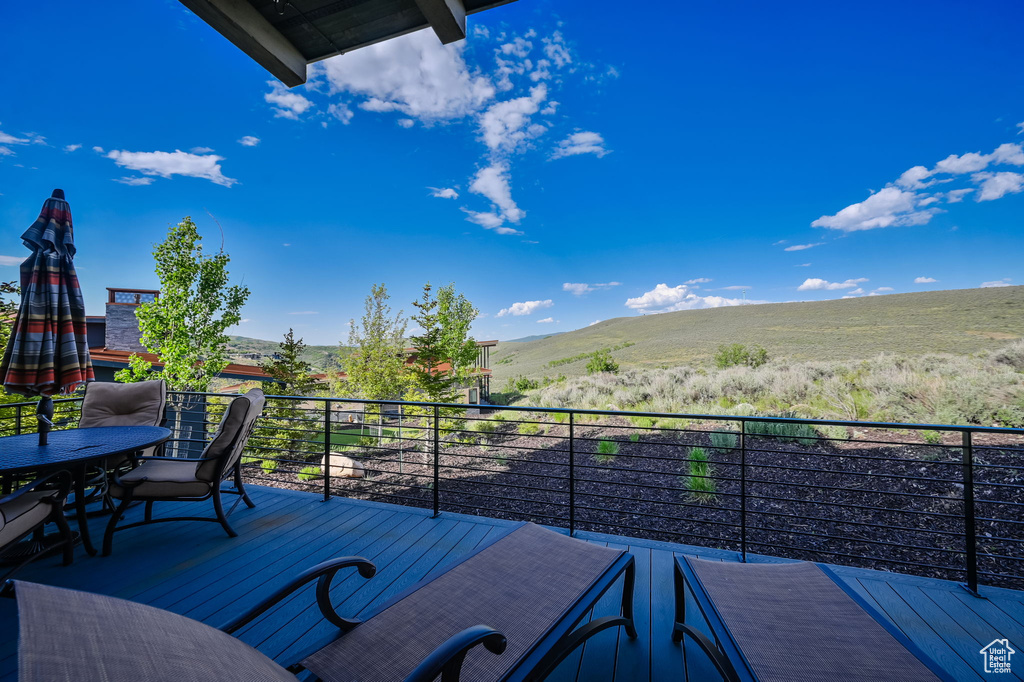 Wooden terrace with a mountain view