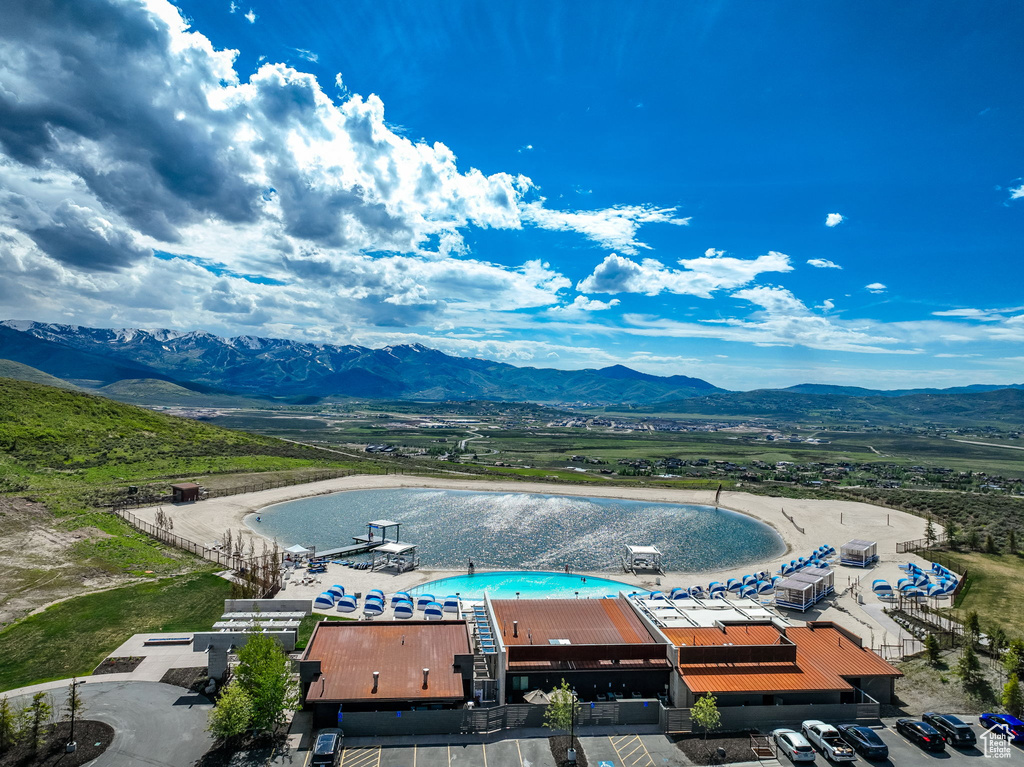 Birds eye view of property featuring a mountain view