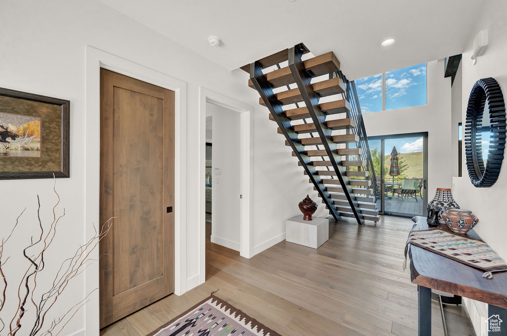 Foyer with hardwood / wood-style floors