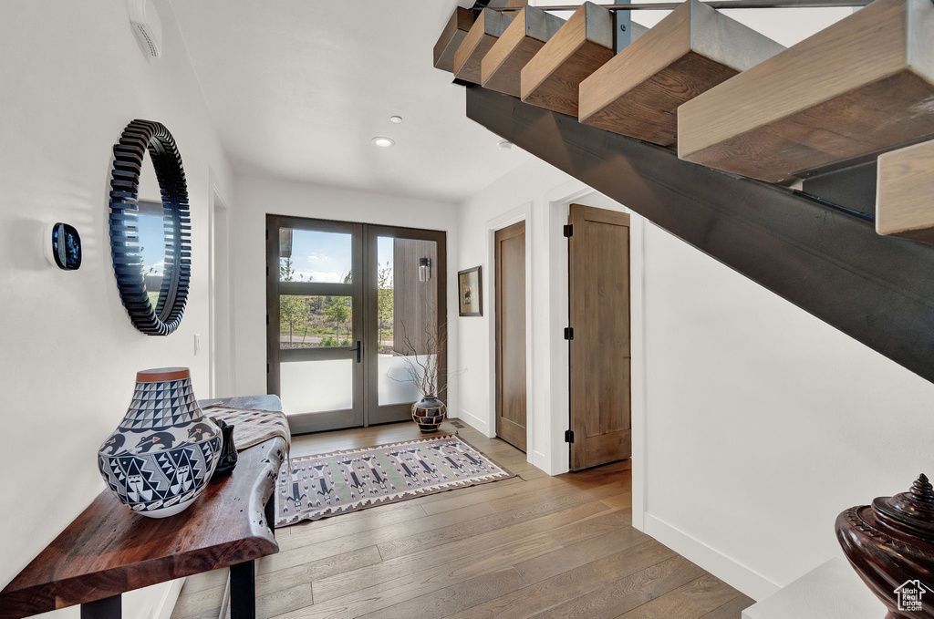 Entryway featuring wood-type flooring