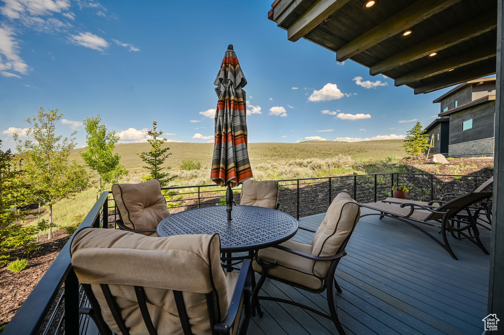 Wooden deck with a rural view