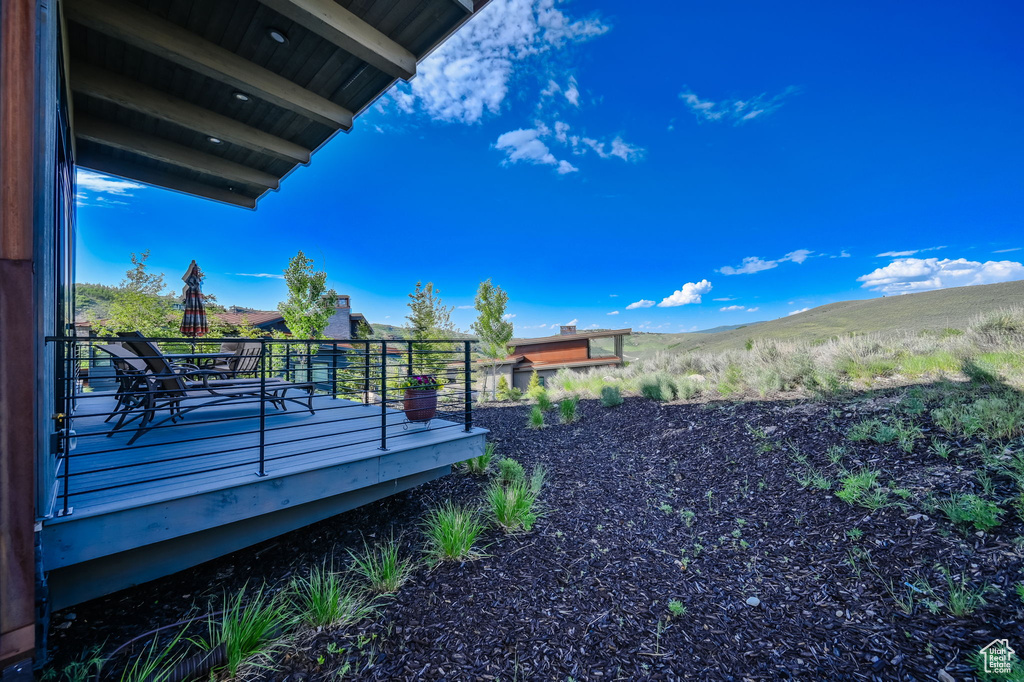 View of yard with a deck