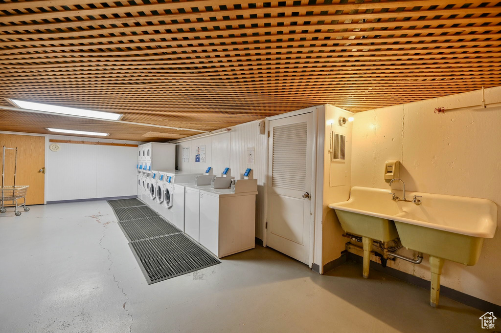 Interior space with washer / dryer and concrete flooring