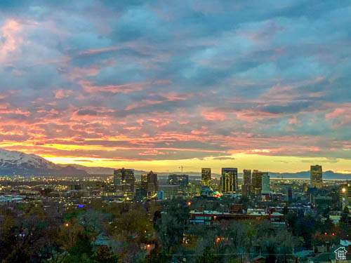 Property's view of city featuring a mountain view