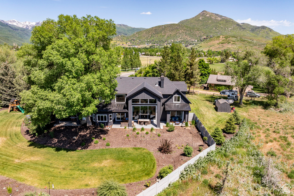 Aerial view featuring a mountain view