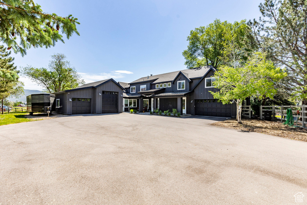 Modern farmhouse style home with a garage