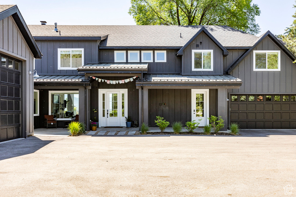 View of front of house featuring french doors