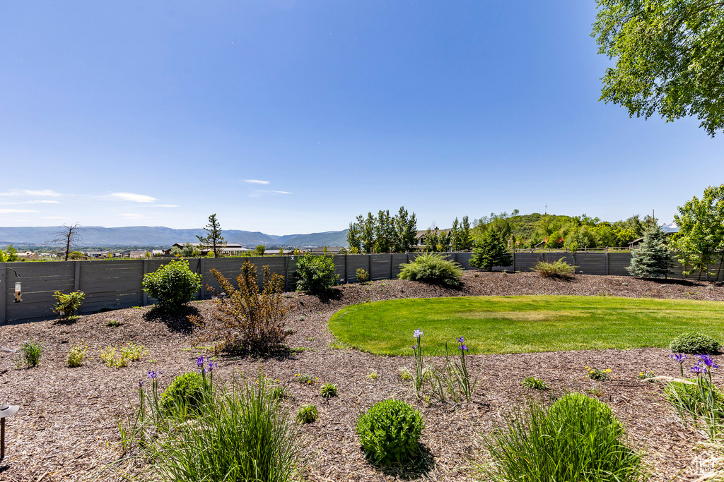 View of yard with a mountain view