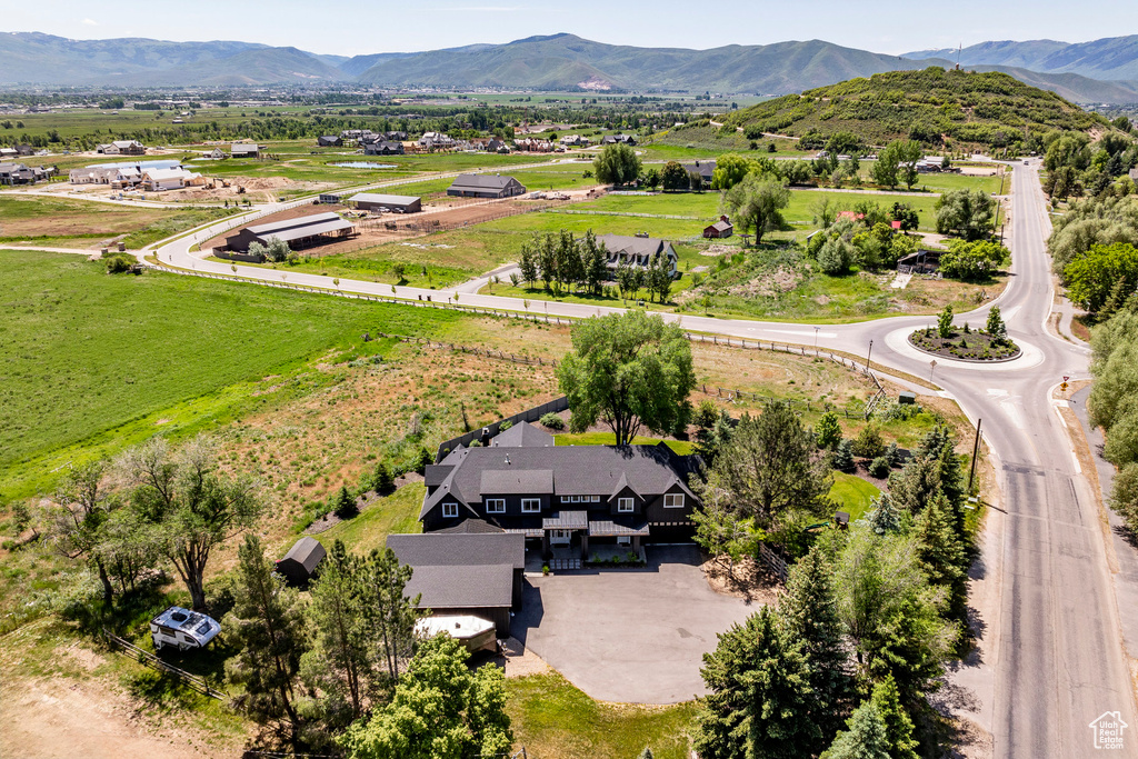 Birds eye view of property featuring a mountain view