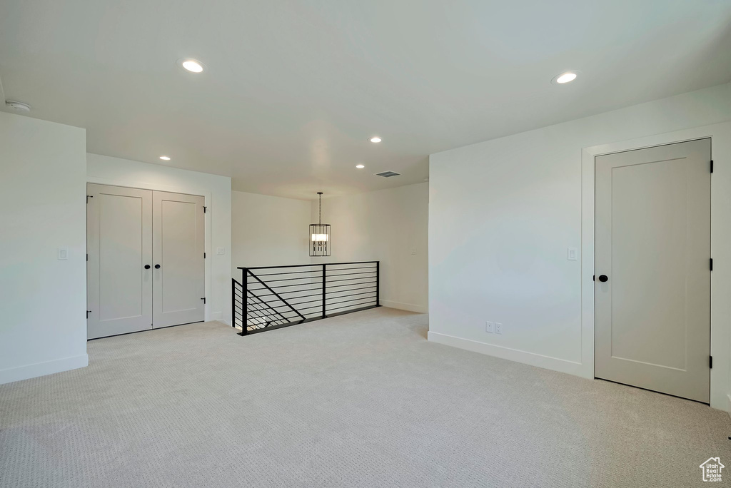 View of carpeted spare room