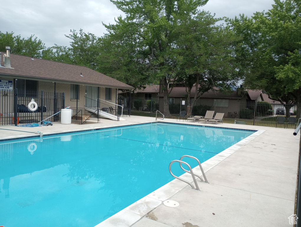 View of pool featuring a patio area