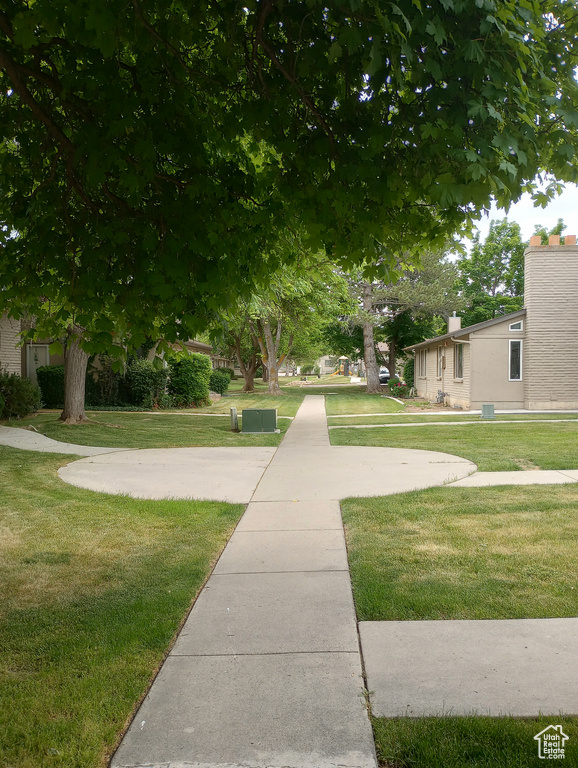 View of home\\\'s community with a lawn