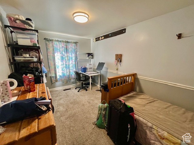 View of carpeted bedroom