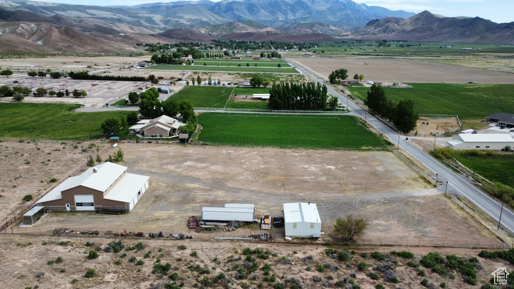 Drone / aerial view with a mountain view and a rural view