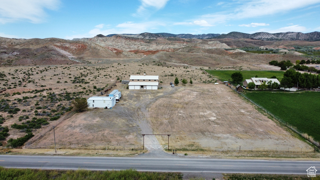 Birds eye view of property featuring a mountain view