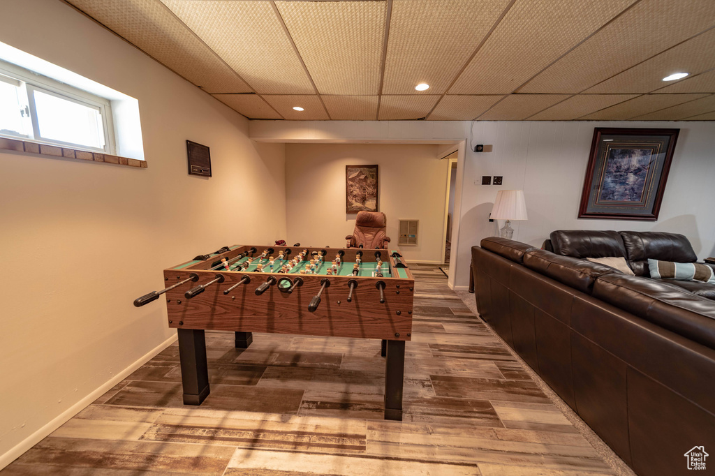 Playroom with hardwood / wood-style flooring