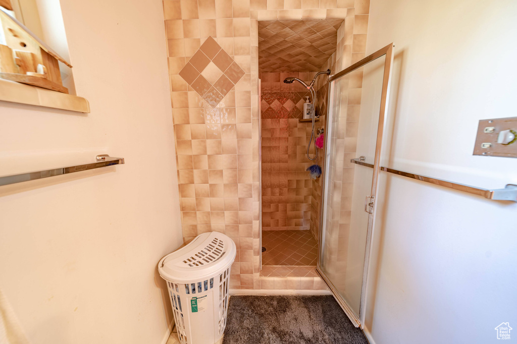 Bathroom featuring an enclosed shower