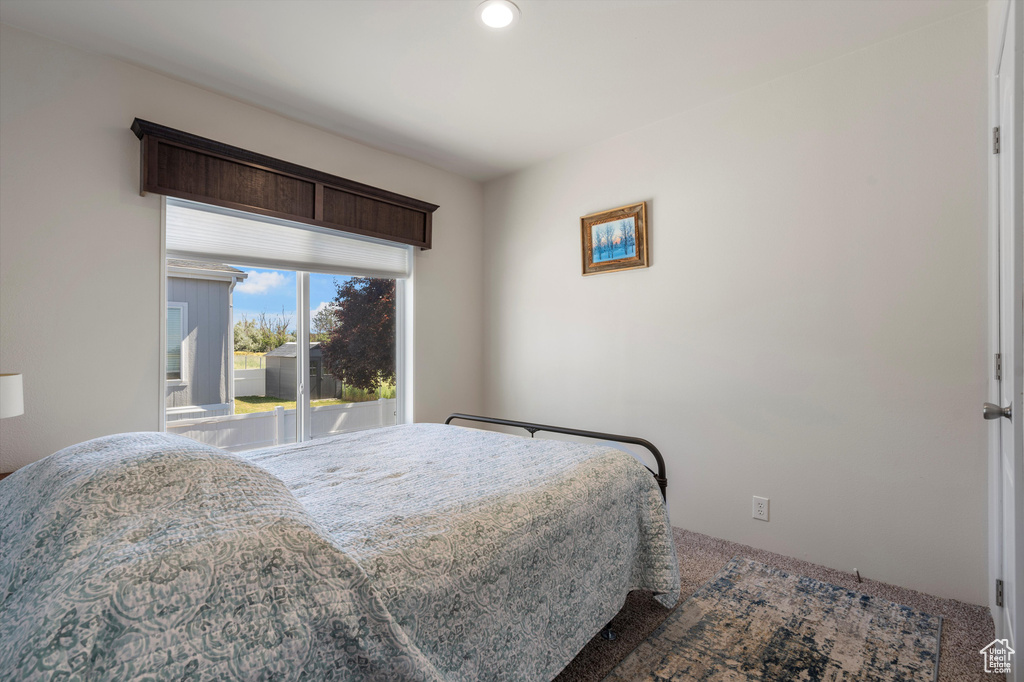 View of carpeted bedroom