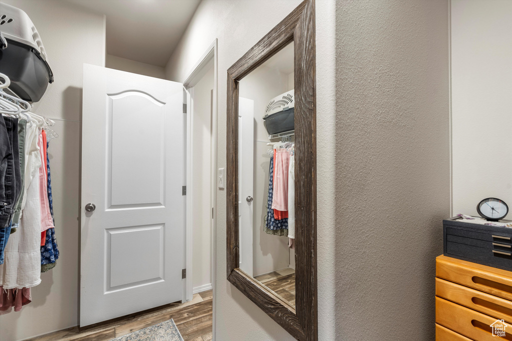 Bathroom with hardwood / wood-style floors