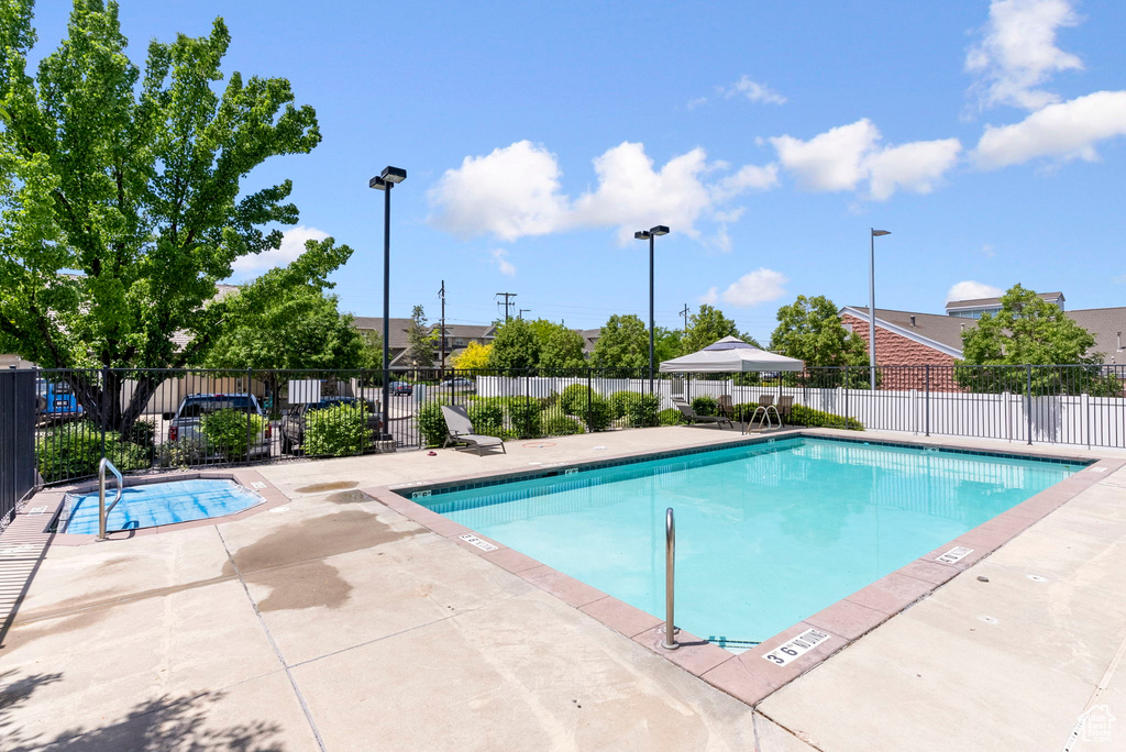 View of pool with a patio area