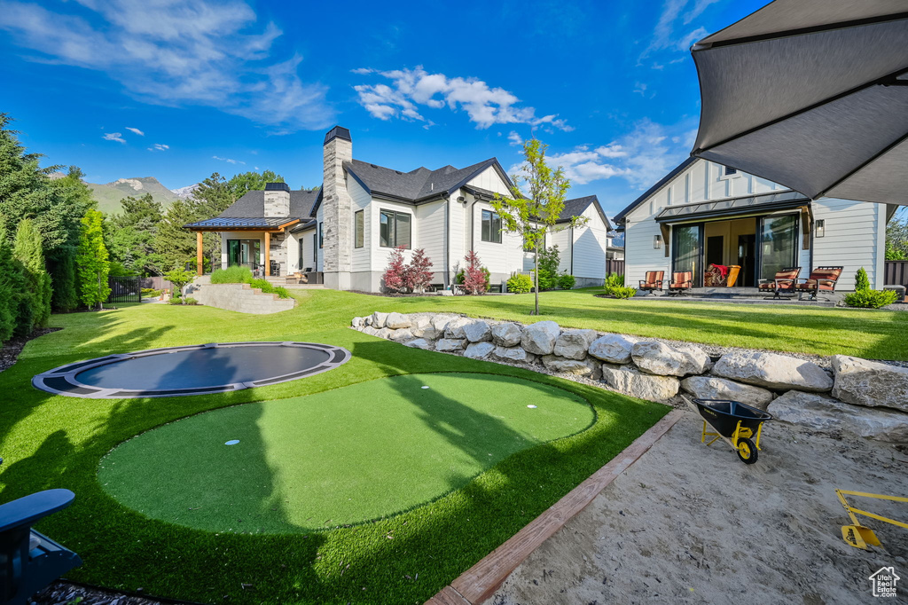 View of yard with a patio area