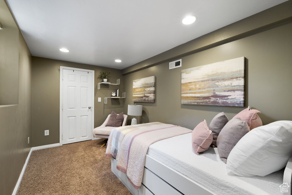 Bedroom featuring carpet