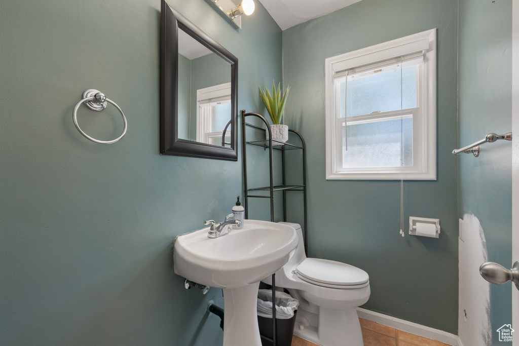 Bathroom featuring tile flooring and toilet