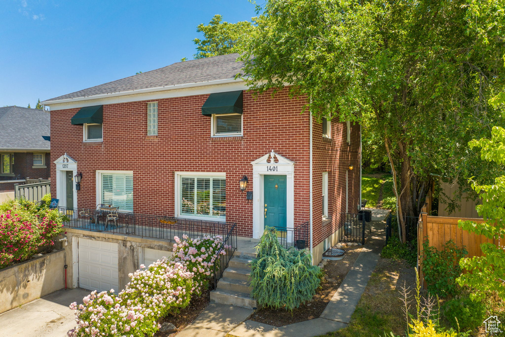 View of front of home with a garage