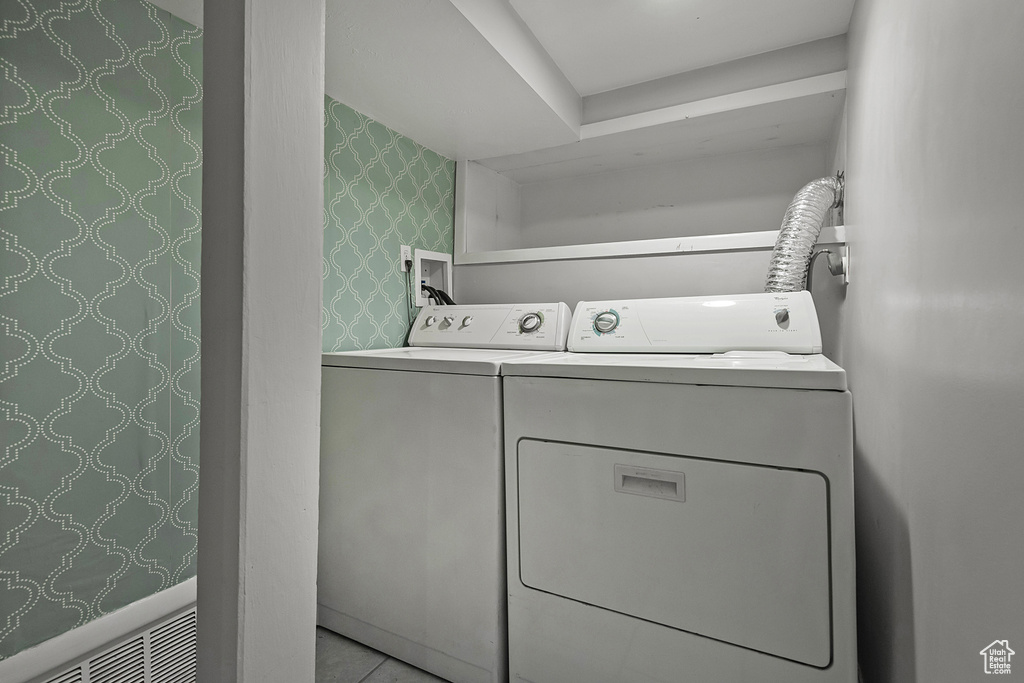 Washroom with separate washer and dryer and hookup for a washing machine