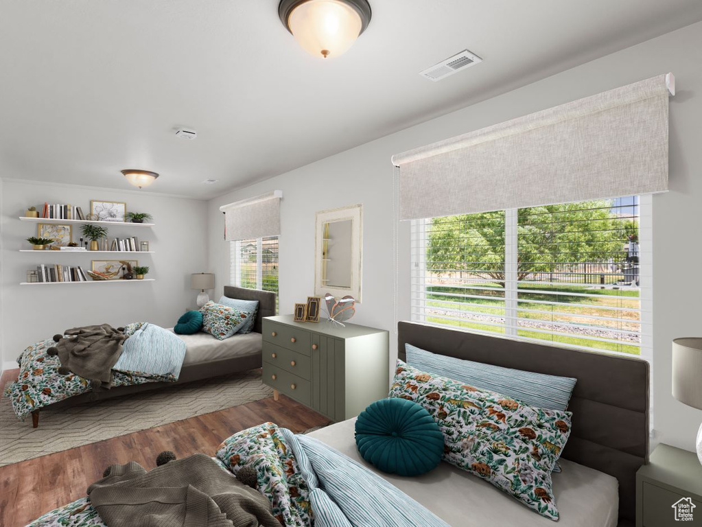 Living room with hardwood / wood-style floors and plenty of natural light