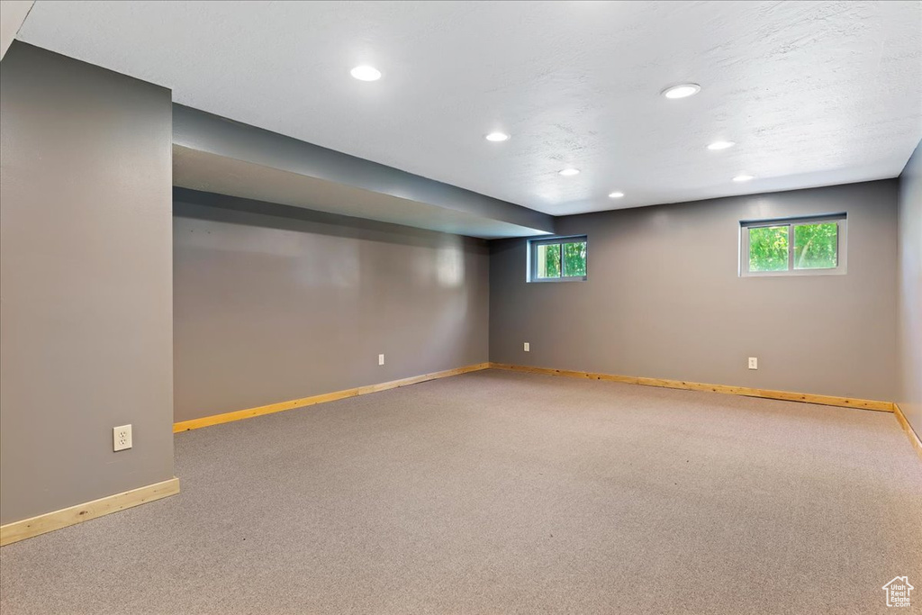 Basement with carpet flooring