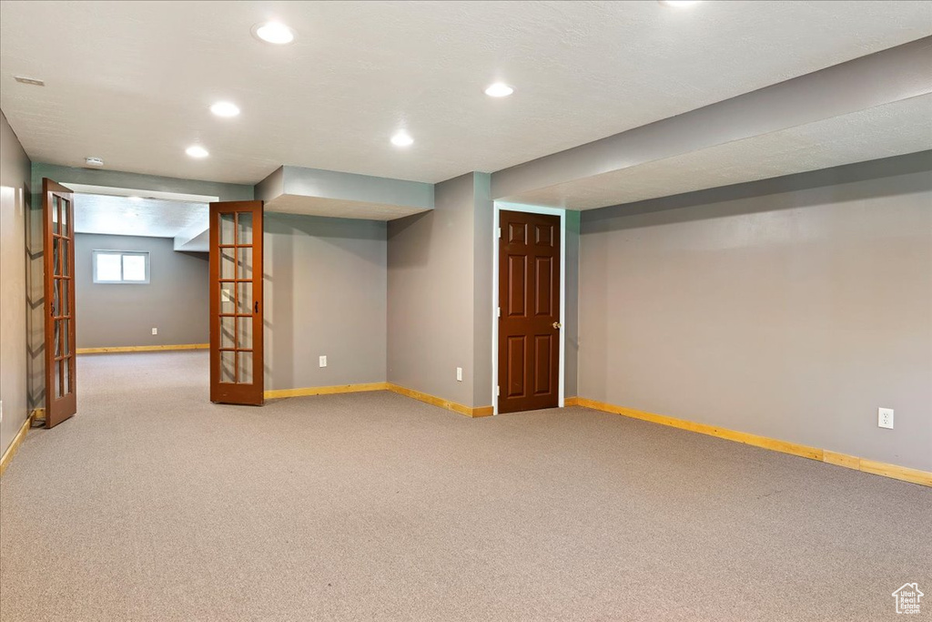 Basement with carpet