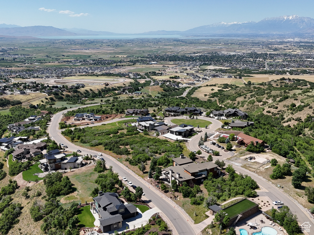 Birds eye view of property with a mountain view