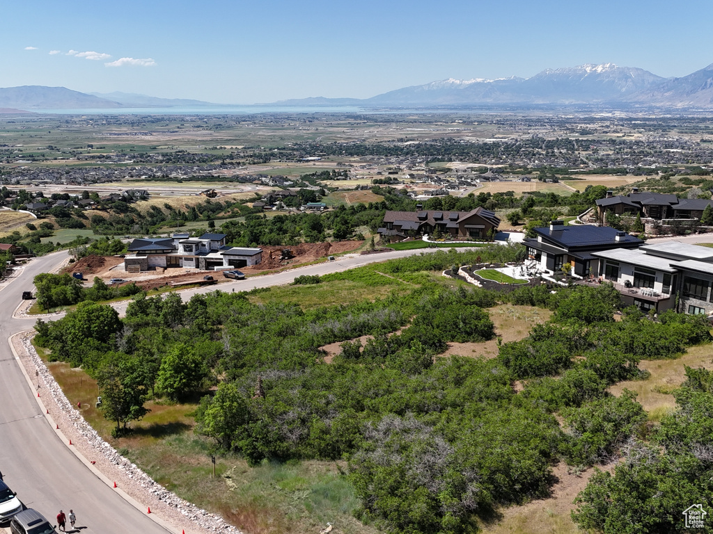 Birds eye view of property with a mountain view