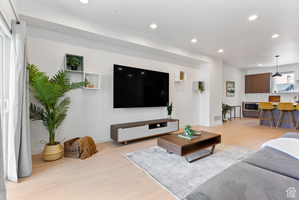 Living room featuring light hardwood / wood-style flooring