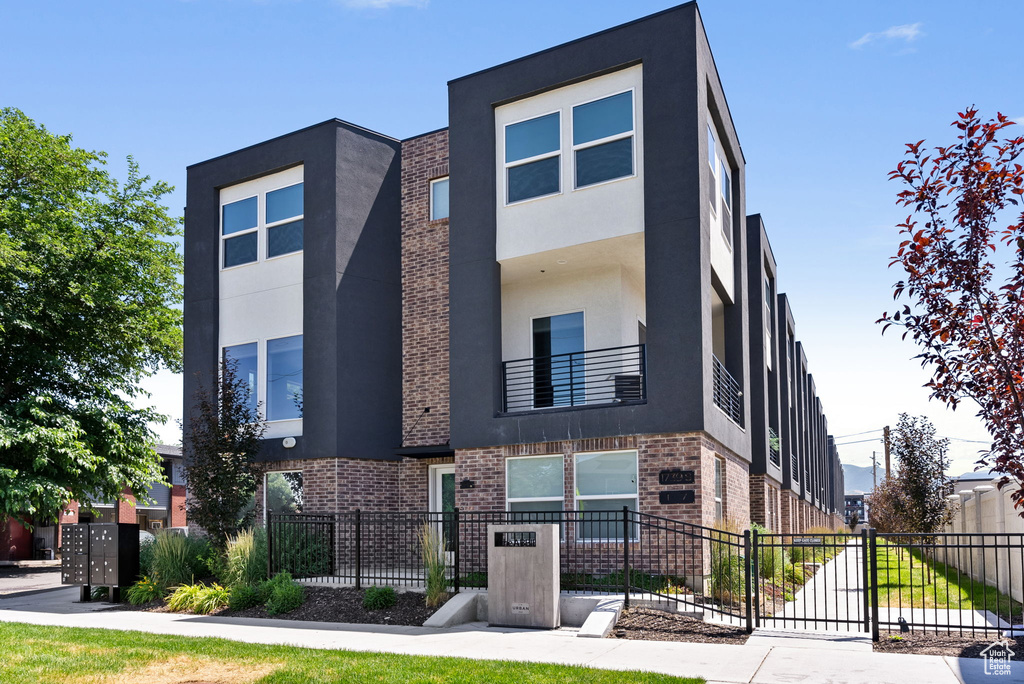 Contemporary home featuring a balcony