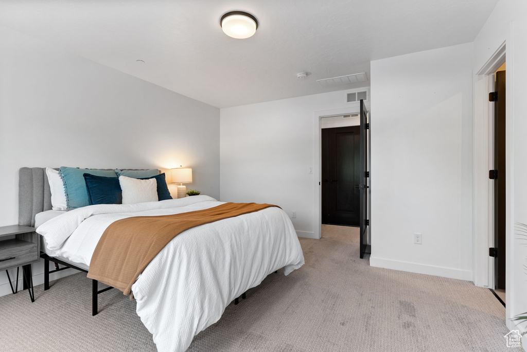 View of carpeted bedroom