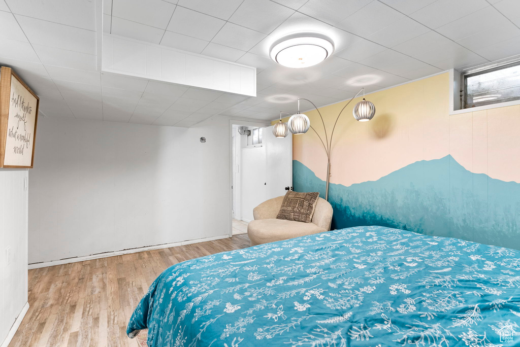 Bedroom featuring wood-type flooring