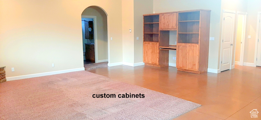 Unfurnished room featuring tile patterned flooring