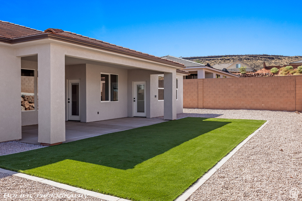 View of yard with a patio area