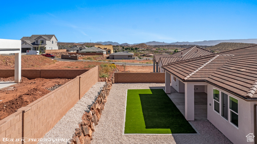 View of yard featuring a mountain view