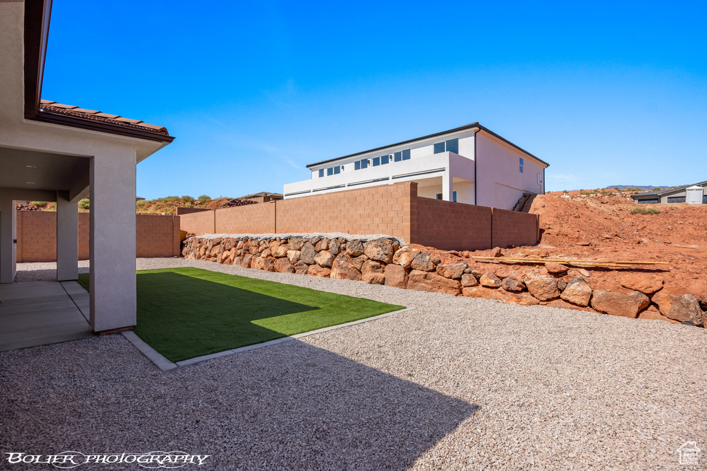 View of yard with a patio area