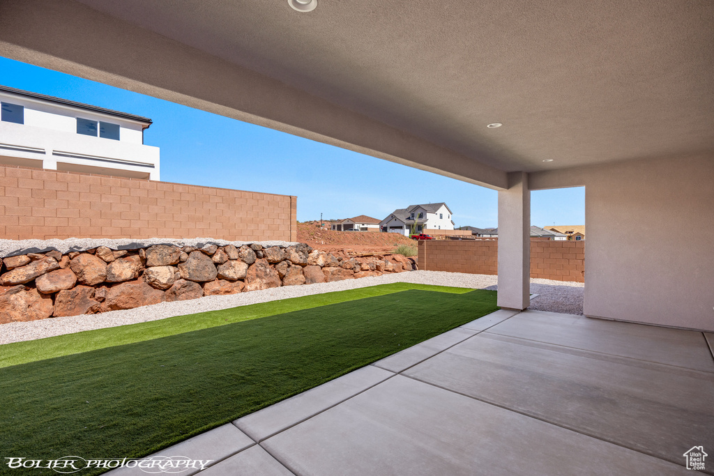 View of yard with a patio area