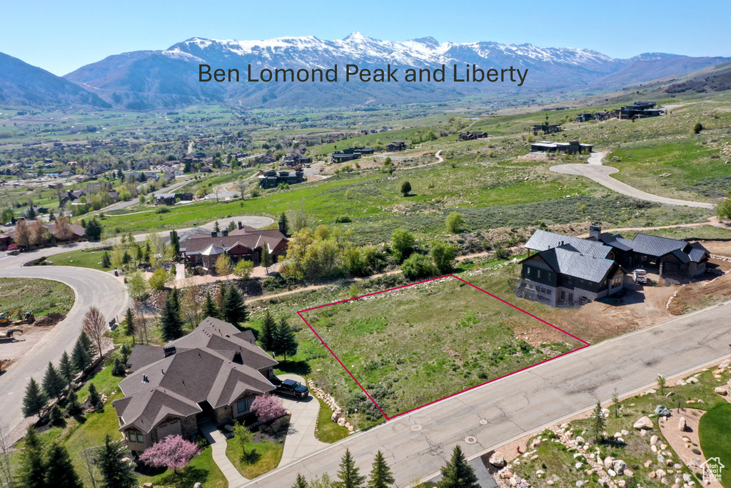 Drone / aerial view featuring a mountain view