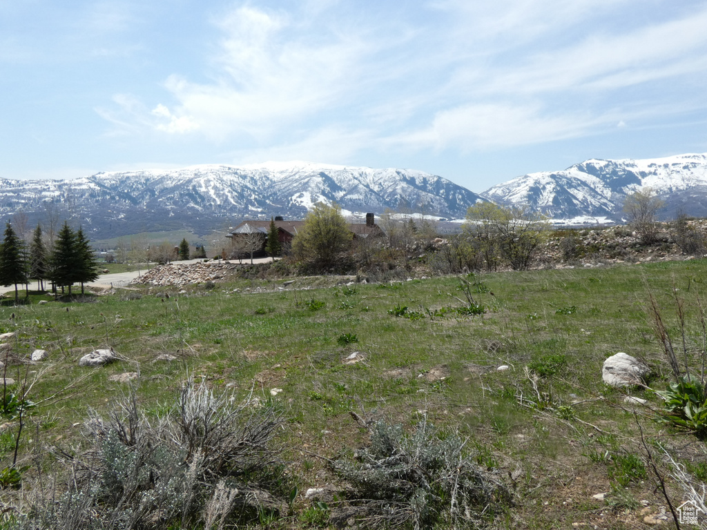 Property view of mountains featuring a rural view