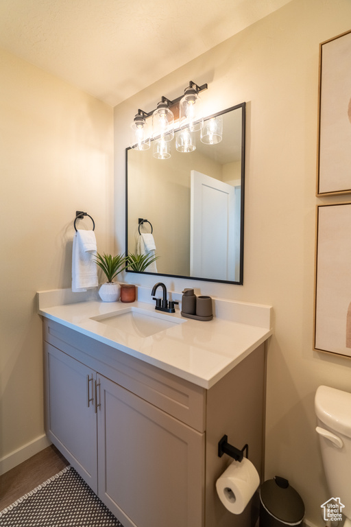 Bathroom with toilet and vanity