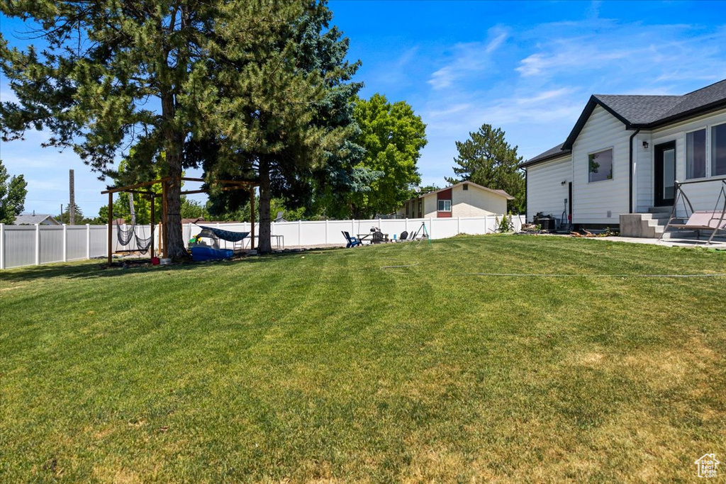 View of yard with a patio area