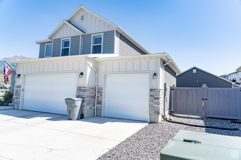 View of front of home featuring a garage